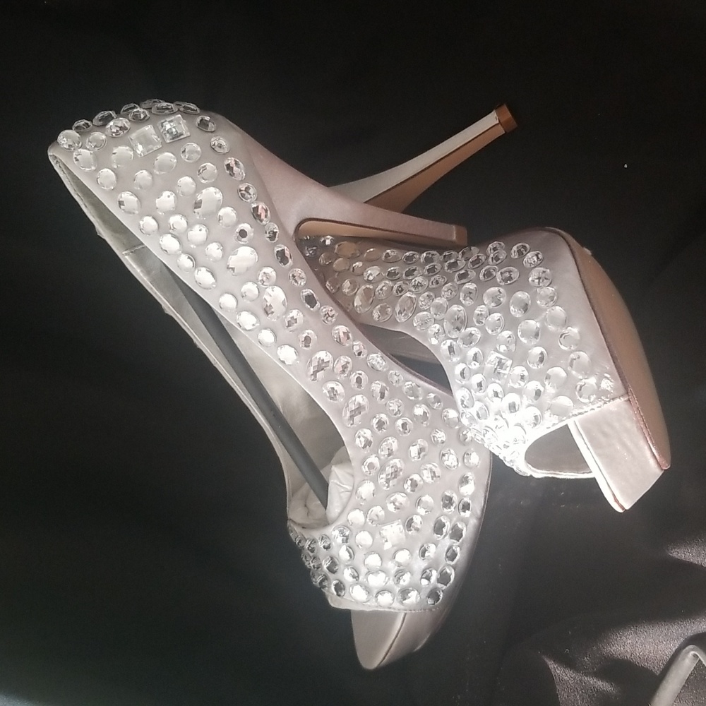 Highest Heel Precious silver heel sz. 9